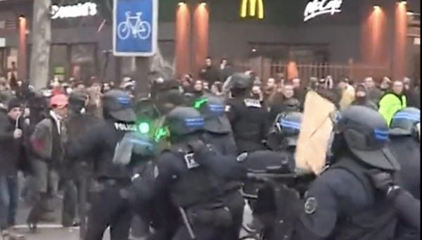 Violence Erupts as Thousands Storm Streets In France Over Macron’s Pension Reforms